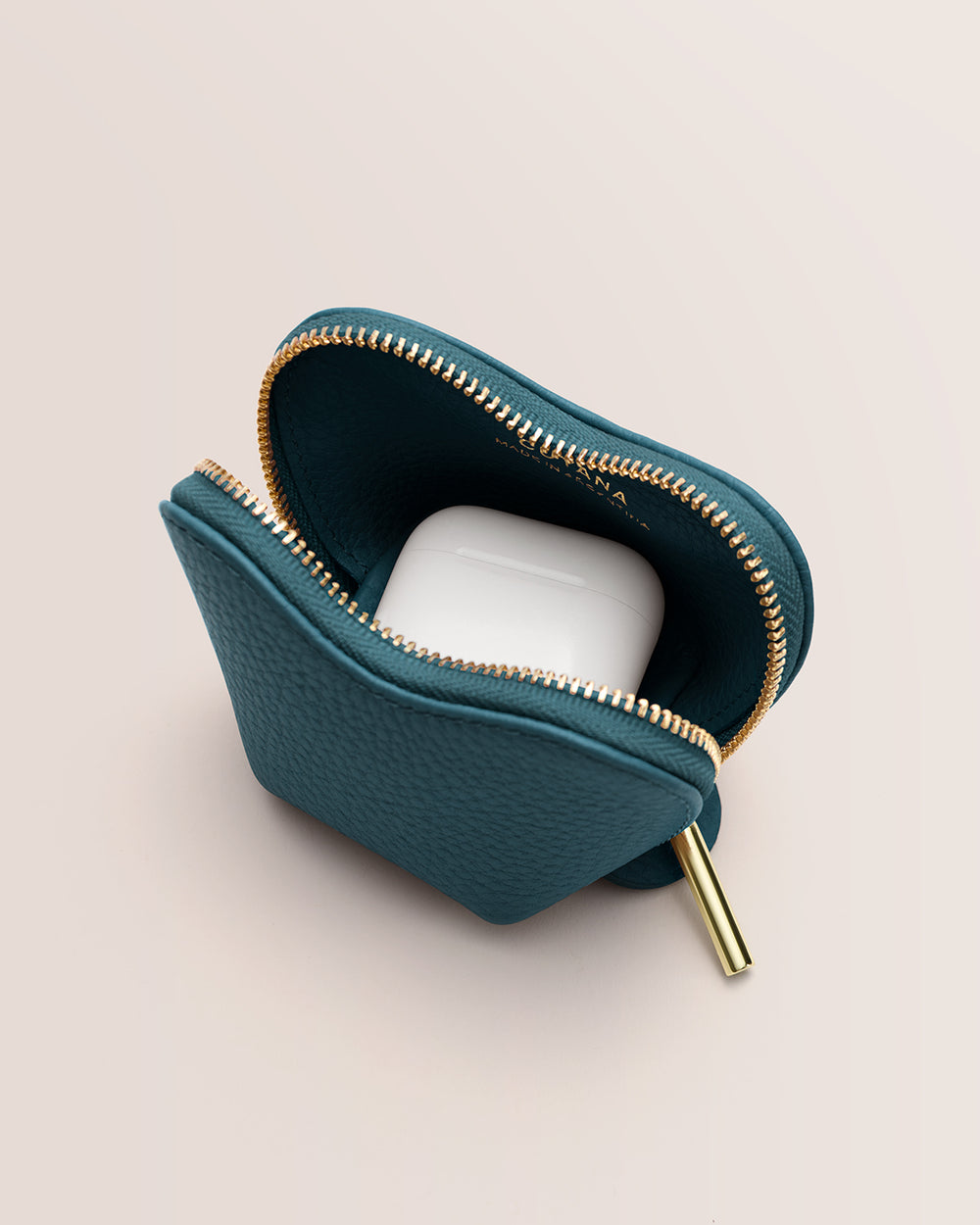 Small zippered pouch holding wireless earbuds case.
