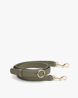 Thin strap with gold clips and adjustable buckle.