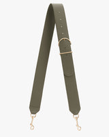 Bag strap with gold clips and an adjustable buckle.