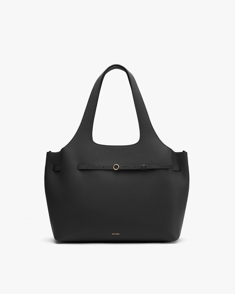 Tote bag with two handles and front strap detail.