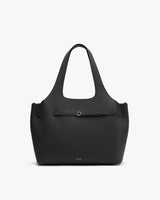Tote bag with two handles and front strap detail.
