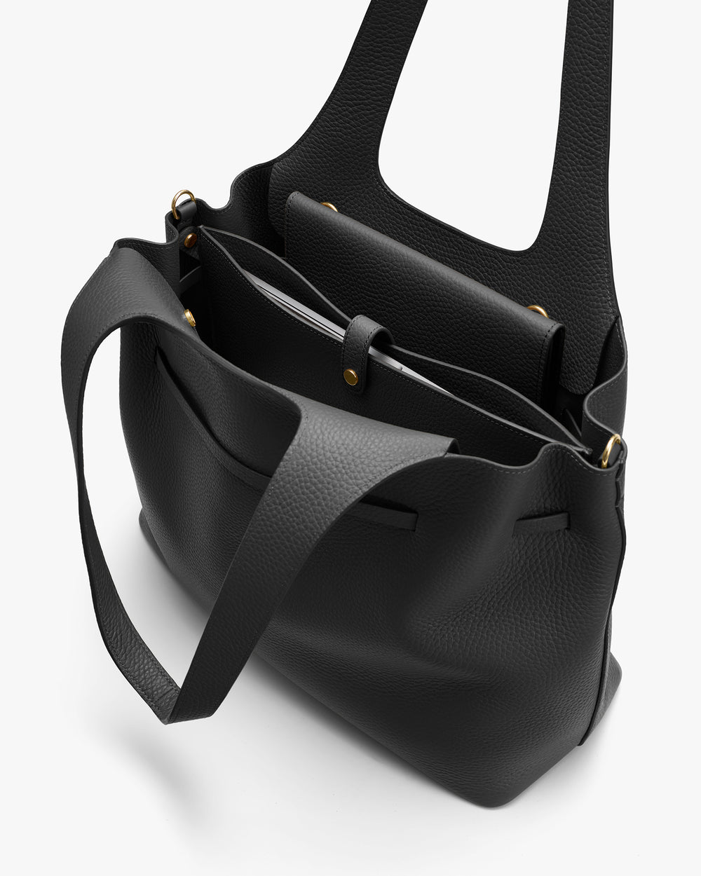 Open handbag with multiple compartments and a shoulder strap.