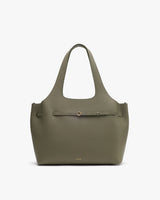Tote bag with belt detail in the center and two handles.