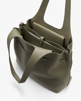 Open tote bag with handles and inner pockets.