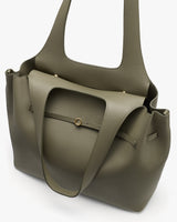 Tote bag with shoulder straps and front pocket.