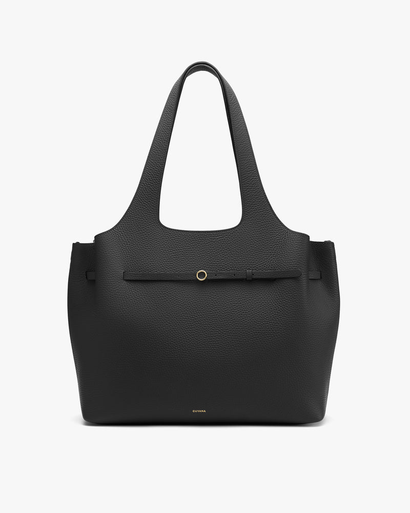 Tote bag with two handles and a front strap detail.
