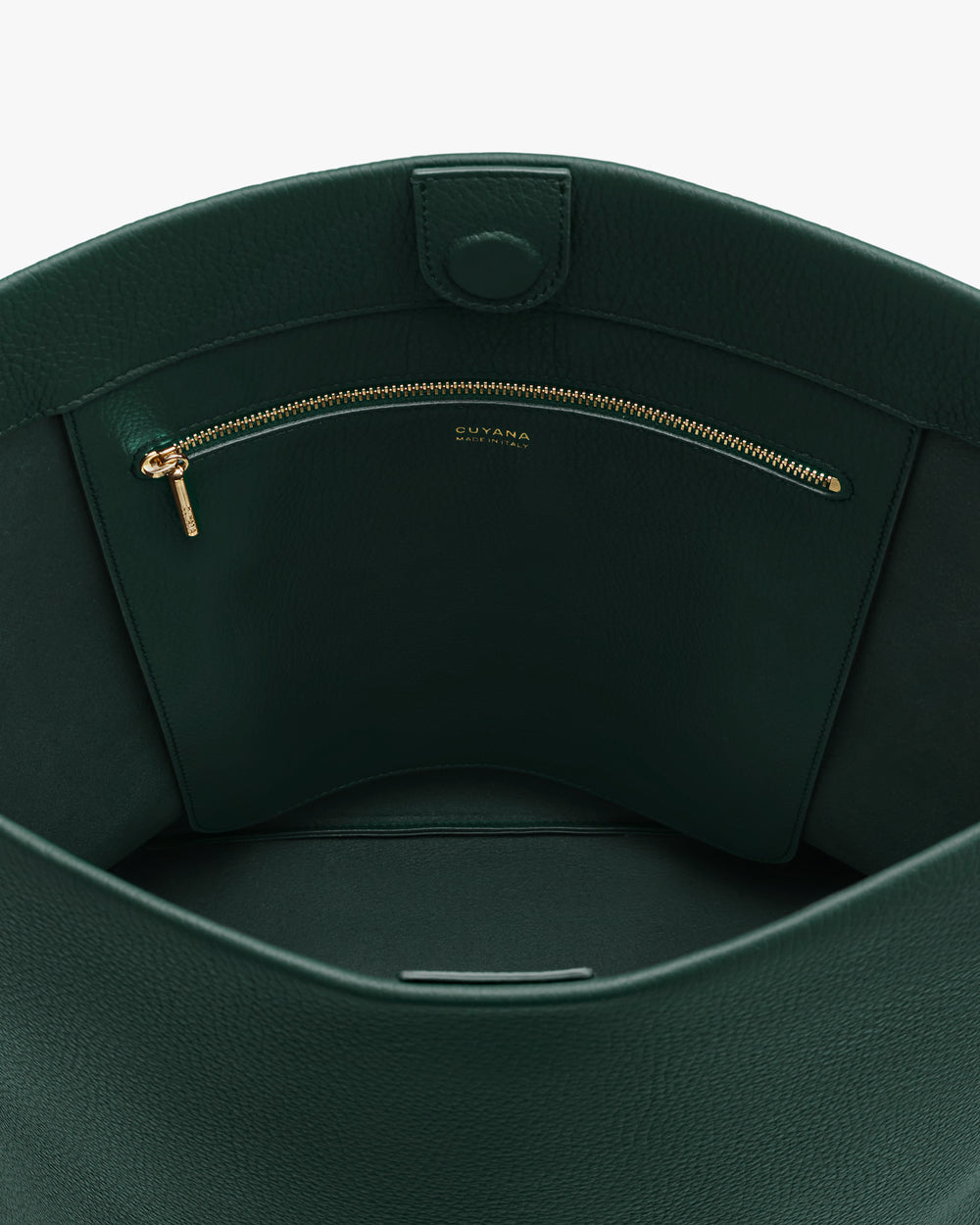 Open view of a bag's interior with a zippered pocket