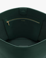 Open view of a bag's interior with a zippered pocket