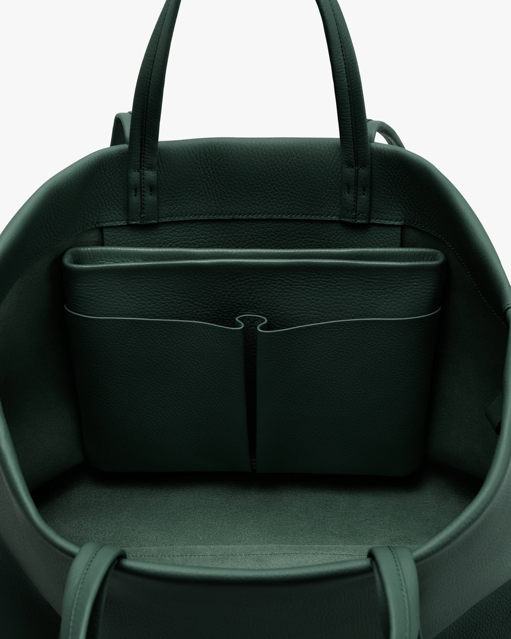 Open travel bag with interior pocket and handles visible.