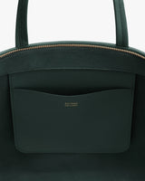 Open handbag with interior pocket and visible zipper.