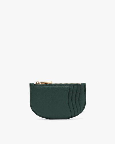 Semicircular coin purse with stitched detailing and a zipper on top.
