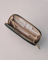 Open wallet with multiple compartments and zipper.