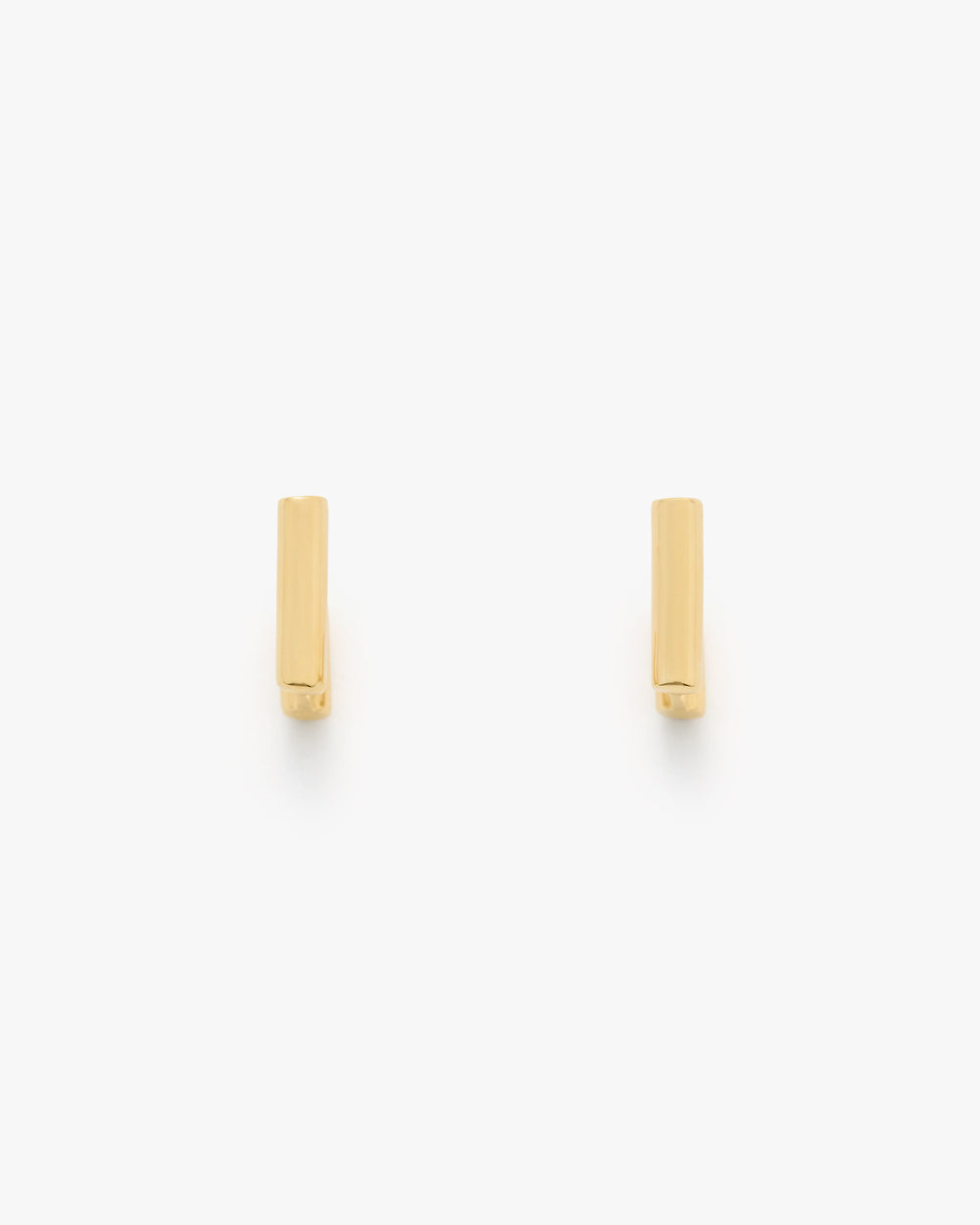 Two minimalist rectangular earrings side by side