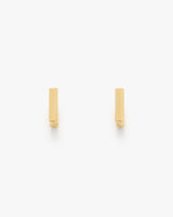 Two minimalist rectangular earrings side by side