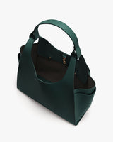 Handbag with wide handle and open top view.