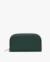 Wallet with rounded top and zipper on a plain background.