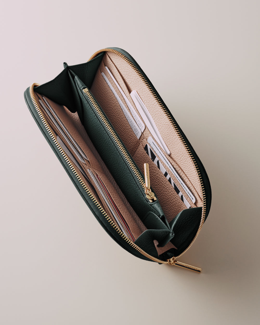 Open wallet with multiple card slots and zipper compartment