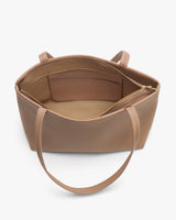 Open handbag with interior pocket and zipper compartment.
