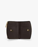 Wallet with a zipper and snap buttons, featuring card slots.