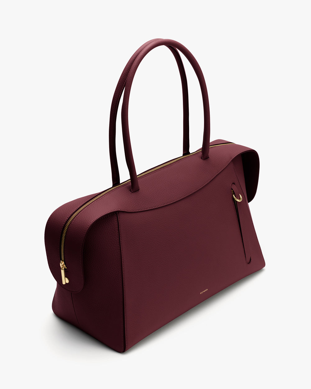 Elegant handbag with curved handles and gold zipper detail