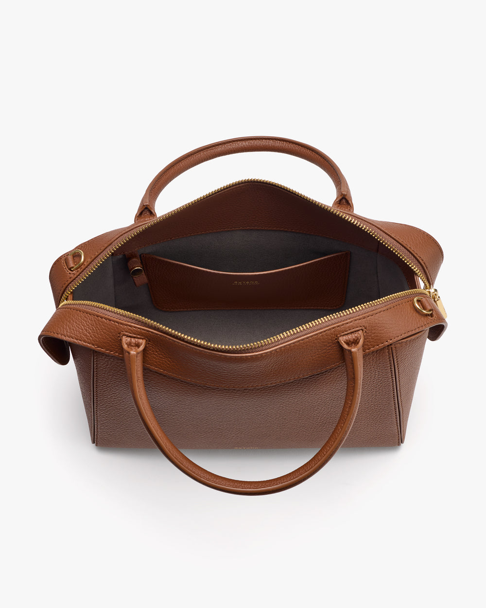 Open handbag with handles, displaying interior and zippered pocket.