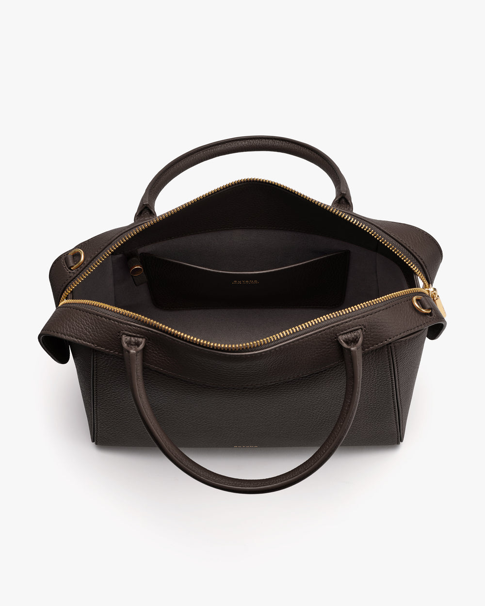 Open handbag with zipper and two handles, showing interior compartment.