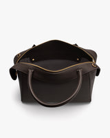 Open handbag with handles and visible interior zip pocket