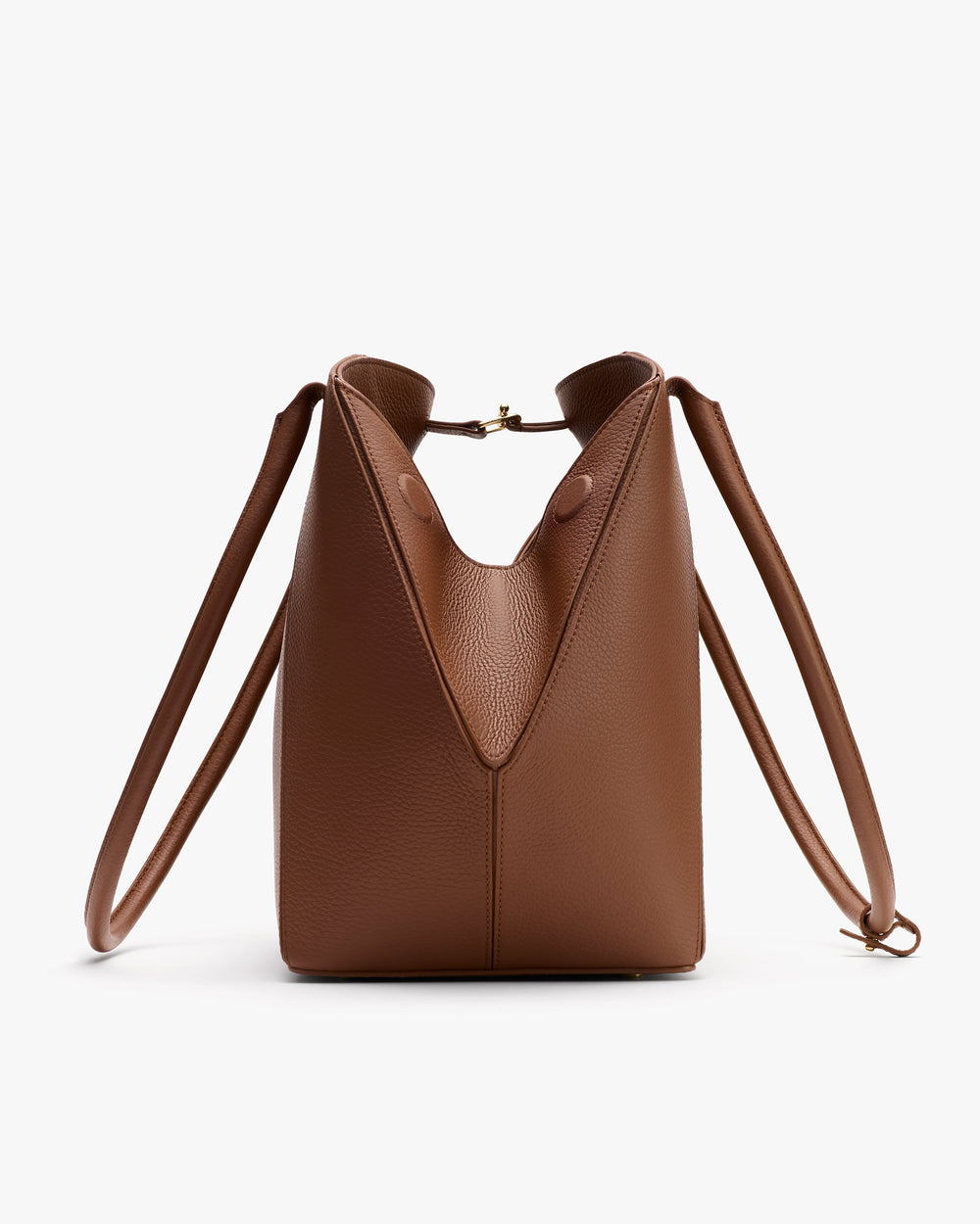 Leather handbag with two straps and gold clasp on top.