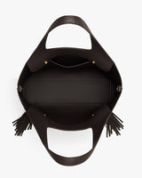 Open bag with handles and tassel details.
