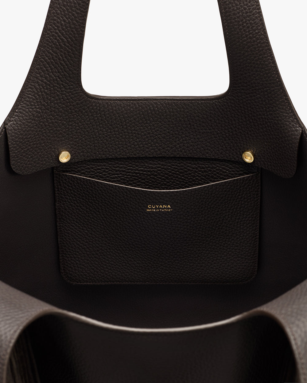 Open tote bag with interior pocket and gold buttons.