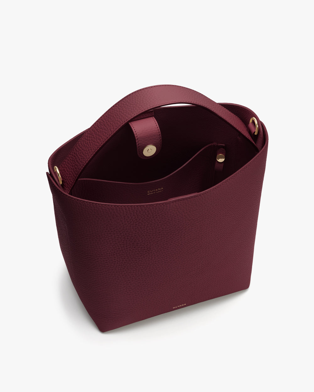 Open tote bag with two handles and a small interior pocket.