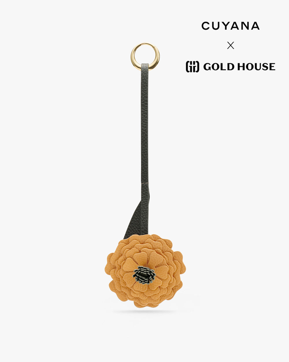 Flower-shaped keychain with ring and strap on display. Logos in upper right corner.