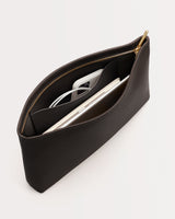 Zip pouch containing a phone and other items inside.