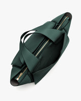 Top view of travel bag with zipper and handles.