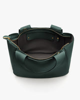 Open travel bag with handles and visible interior pockets.