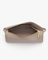 Open purse with a visible zippered compartment and an inner pocket.
