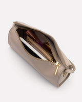 Open cosmetic bag with visible items inside.