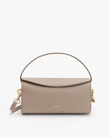 Rectangular handbag with a handle and detachable strap.