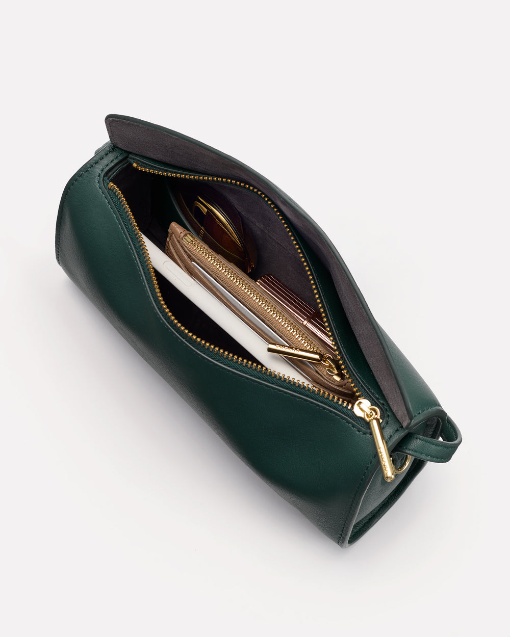 Open makeup bag with various items inside