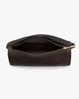 Open leather bag with visible zipper and interior pocket.