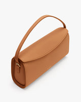 Rectangular handbag with top handle and curved flap
