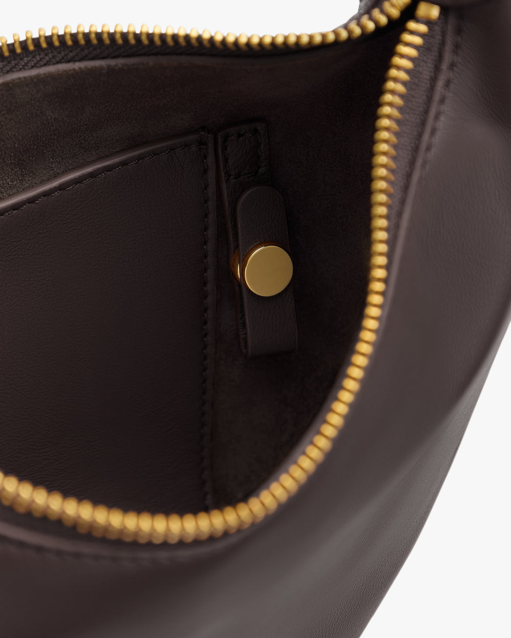 Open purse with zipper and interior pocket.