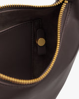Open purse with zipper and interior pocket.