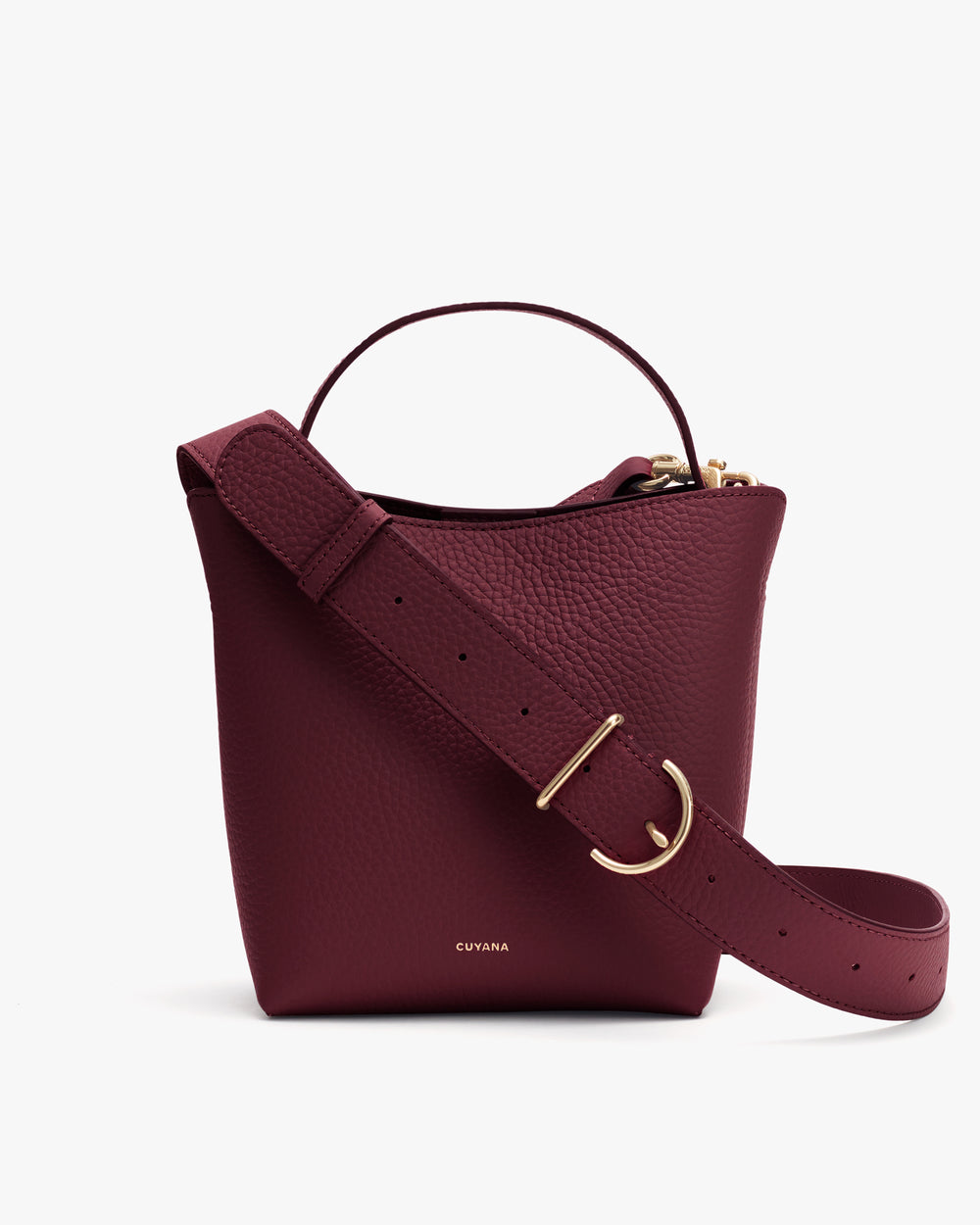 Small handbag with a handle and a broad strap
