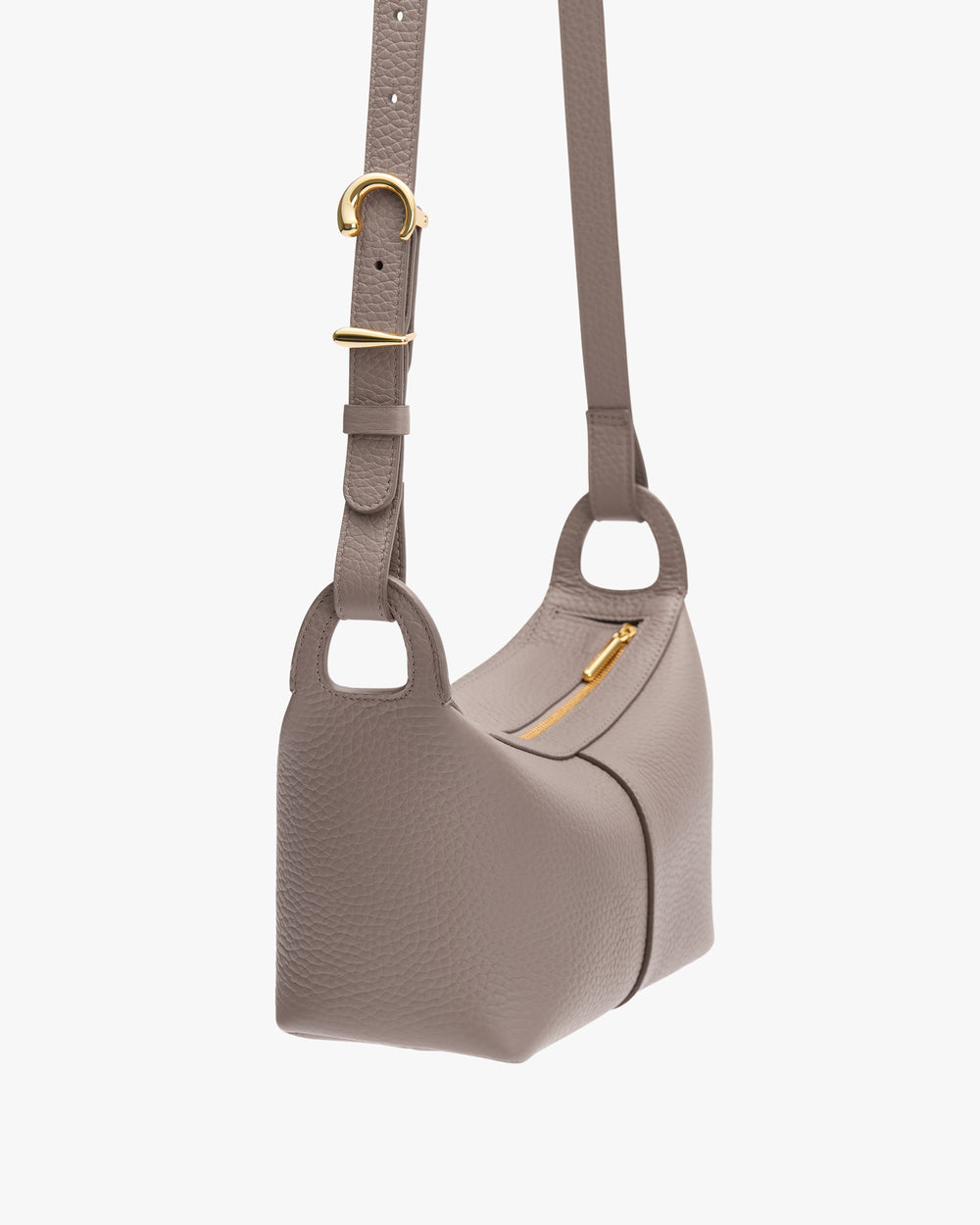 Shoulder bag with adjustable strap and small zip pocket.