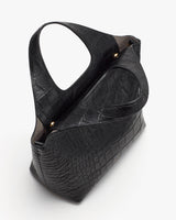 Bag with croc-embossed leather texture and a wide handle.