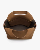 Open top view of a tote bag with two side handles and a pocket inside.