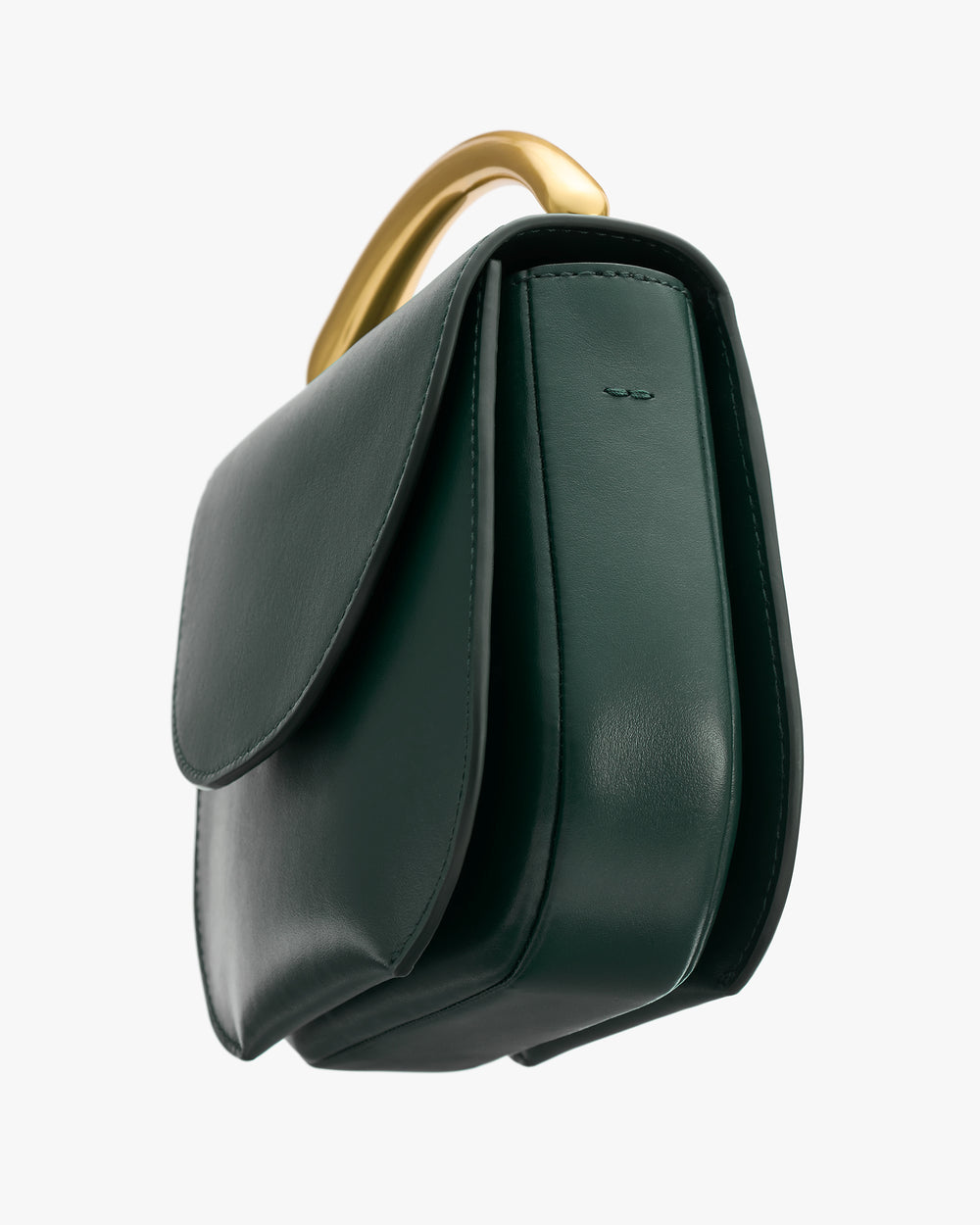 Handbag with curved handle and flap closure viewed from the side