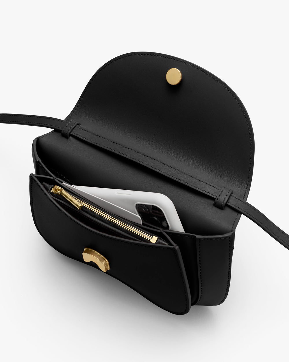 Open handbag showing interior pocket with a phone and a zipped compartment.