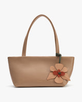 Handbag with flower decoration and two handles